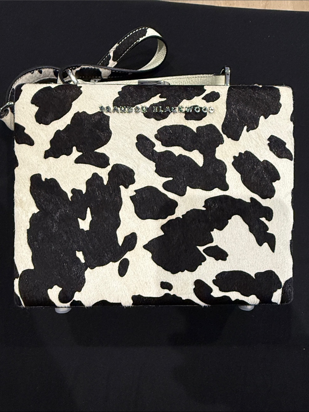 Brandon Blackwood Black and White Cow Print Wristlet
